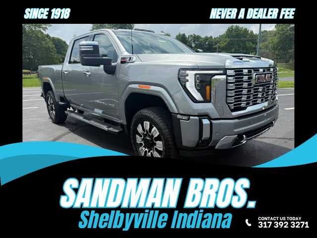 2025 GMC Sierra 3500 HD Denali in Sterling Metallic — front three-quarter view