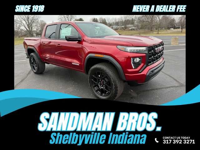 2026 GMC Canyon Elevation in Volcanic Red Tintcoat — front three-quarter view