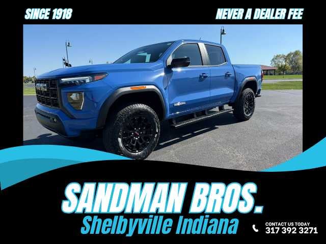 2026 GMC Canyon Elevation in Rapids Metallic — front three-quarter view