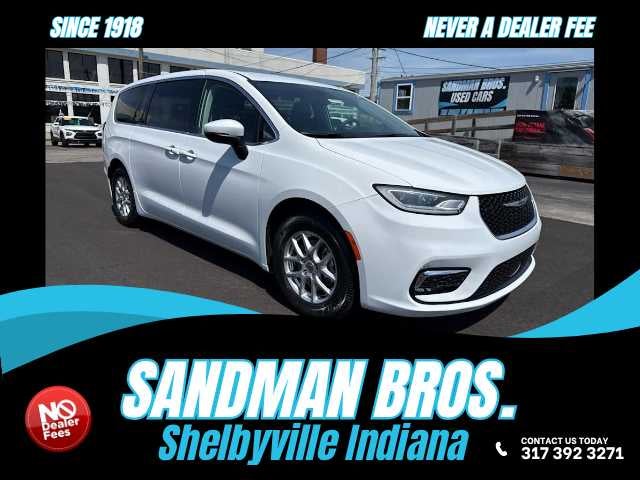 2023 Chrysler Pacifica Touring L in White — front three-quarter view