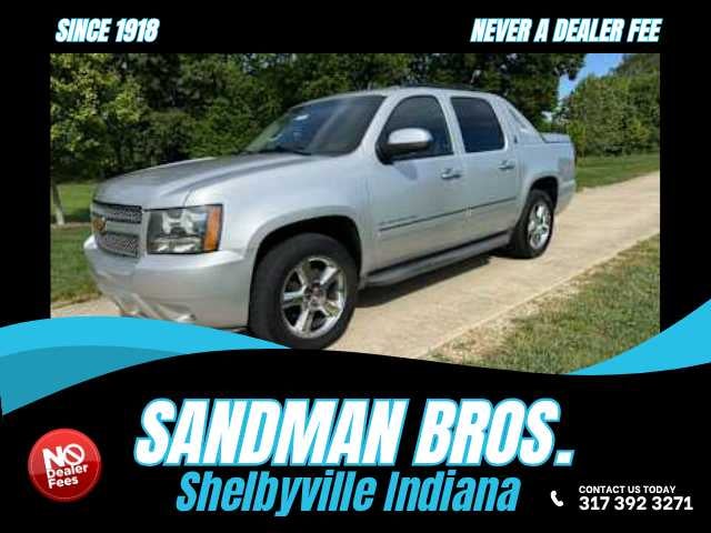 2013 Chevrolet Avalanche LTZ in Silver Ice Metallic — front three-quarter view